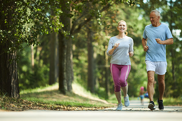 Couple jogging with pain-free knees